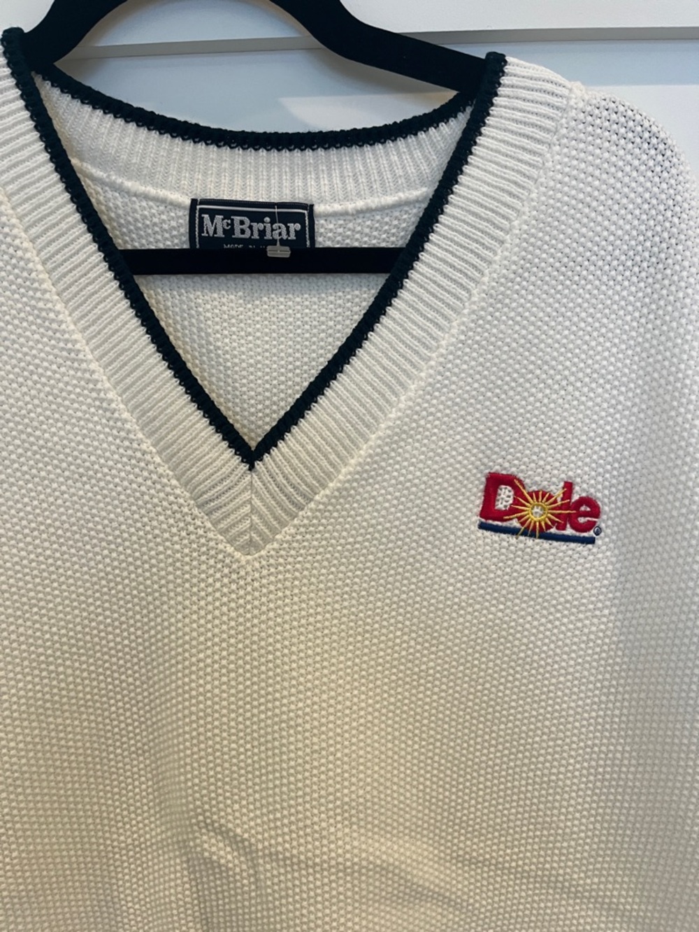 Men’s White V-Neck Golf Sweater Vest with Dole Logo